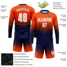 Laden Sie das Bild in den Galerie-Viewer, Uksn Individuelles Orange Weiß-Marineblau Sublimationsdruck Langarm Farbverlauf Fußballtrikot
